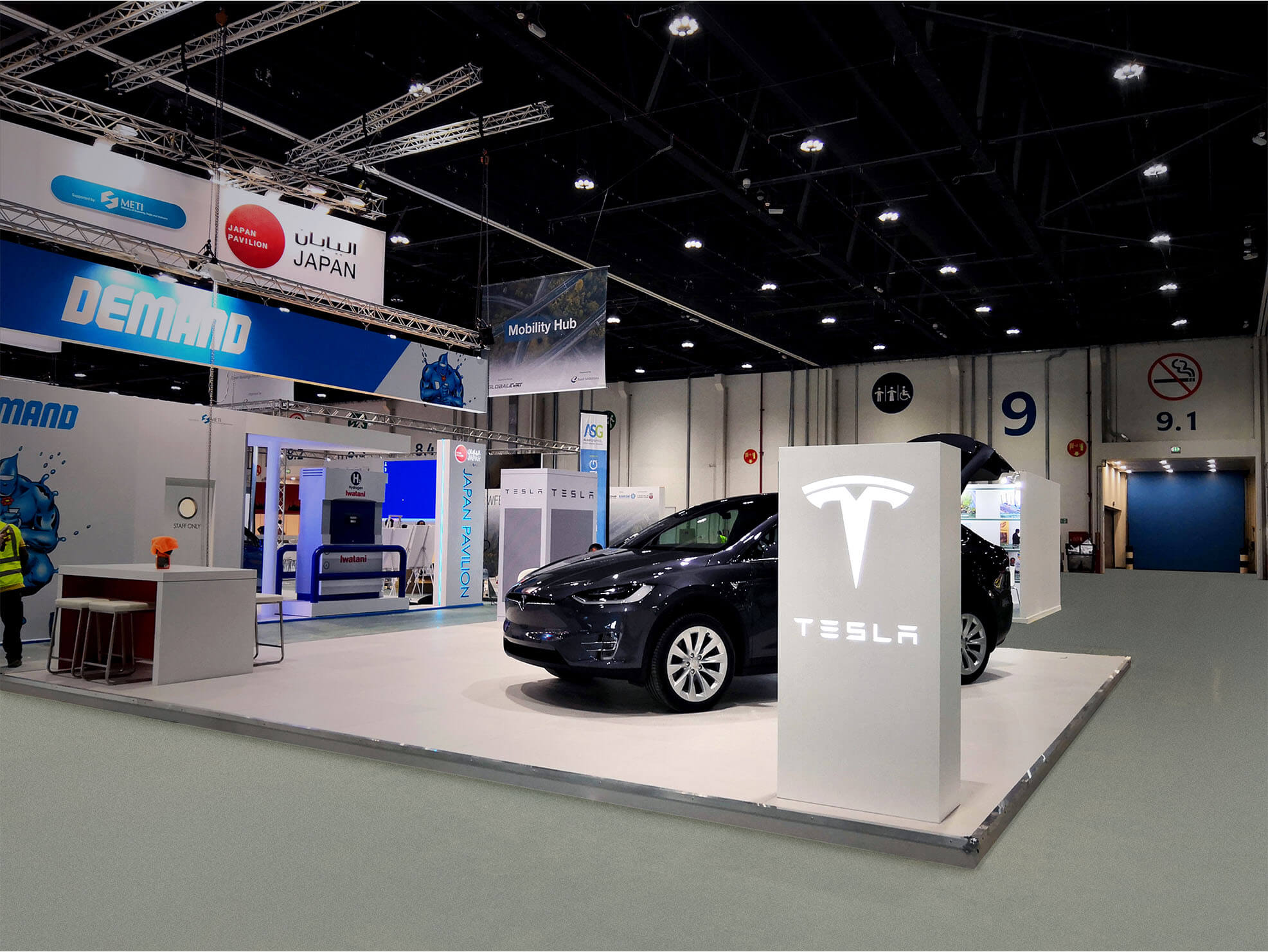 Tesla trade show booth designs