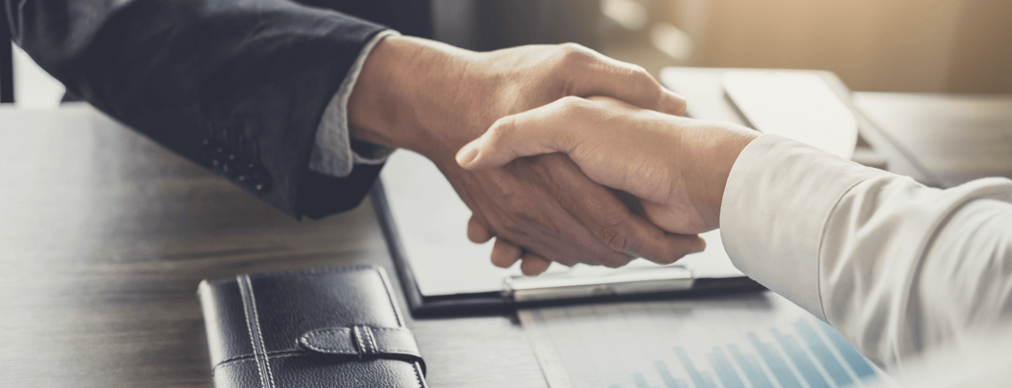 Business partners handshaking in an office