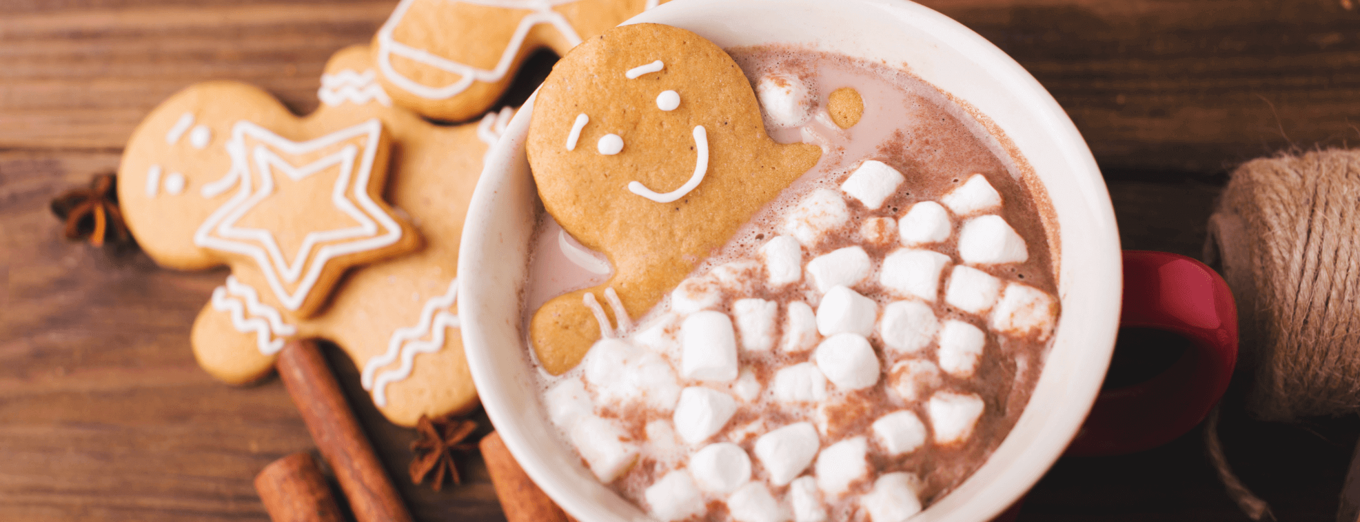 Cookies dipped in hot chocolate on the table